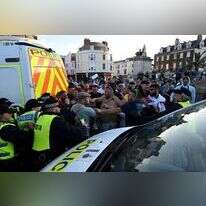 הפגנות נגד מהגרים בבריטניה. | AFP