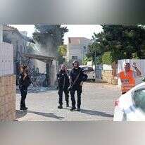 שוטרים בזירת לחימה באשקלון ב־ 7 באוקטובר. | איי.אף.פי