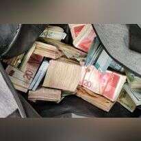 כספים שנתפסו במהלך הפעילות. | משטרת ישראל