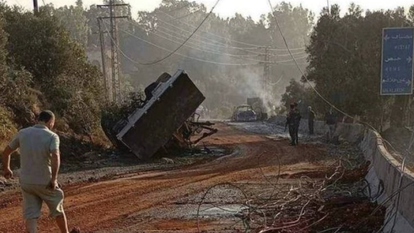 הכביש המוביל למרכז המחקר לאחר התקיפה הישראלית הכביש המוביל למרכז המחקר לאחר התקיפה הישראלית