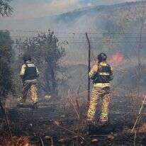 שריפה סמוך קיבוץ שניר כתוצאה מירי חיזבאללה. | EPA