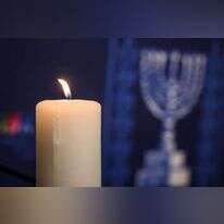 נר זיכרון בטקס לזכר ה7.10 במשרדי האו"ם בז'נבה. | AFP