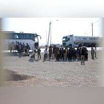 פליטים אפגנים שגורשו מאיראן, סמוך לגבול אפגניסטן-איראן. | AFP