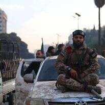 מורד סורי לאחר ההשתלטות על דמשק. EPA