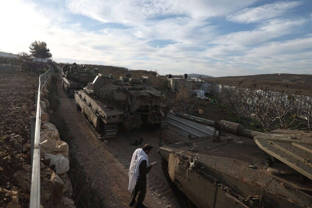 טנקים ישראליים במג'דל שמס. AFP
