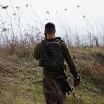 חייל צה"ל על גבול סוריה-ישראל. למצולם אין קשר לכתבה AFP