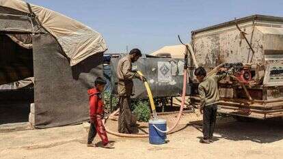 הנושא הכי מטריד בסוריה. חלוקת מים באידליב. | גטי אימג'ס