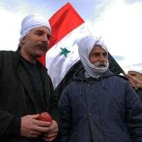 דרוזים על רקע דגל סוריה. | חאמד אלמאקאת, פלאש 90