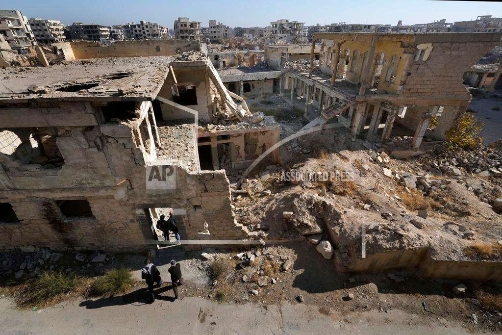 Syrian citizens check the destroyed Jobar Synagogue, also known as Eliyahu Hanavi, in Jobar neighborhood, in Damascus, Syria, Wednesday, Dec. 25, 2024. (AP Photo/Hussein Malla) Syrian citizens check the destroyed Jobar Synagogue, also known as Eliyahu Hanavi, in Jobar neighborhood, in Damascus, Syria, Wednesday, Dec. 25, 2024. (AP Photo/Hussein Malla)