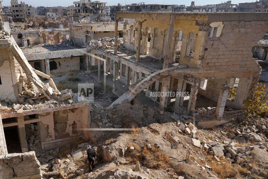 A Syrian man observes the destroyed Jobar Synagogue, also known as Eliyahu Hanavi, in Jobar neighborhood, in Damascus, Syria, Wednesday, Dec. 25, 2024. (AP Photo/Hussein Malla) A Syrian man observes the destroyed Jobar Synagogue, also known as Eliyahu Hanavi, in Jobar neighborhood, in Damascus, Syria, Wednesday, Dec. 25, 2024. (AP Photo/Hussein Malla)