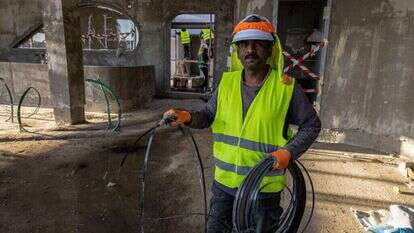 פועלי בניין הודים בישראל. | AFP