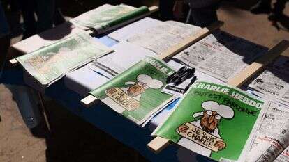 The latest edition of the satirical weekly newspaper Charlie Hebdo during a protest in support of the latest edition of the satirical weekly newspaper Charlie Hebdo in Tel Aviv on February 5, 2015, The Israeli election committee forbidden Yisrael Beytenu political party to distribute any gifts or free merchandise to the public in such proximity to the elections including the latest edition of Charlie Hebdo. Photo by Ben Kelmer/Flash90

 *** Local Caption *** àáéâãåø ìéáøîï
éùøàì áéúðå
îôìâä
äôâðä
öòéøé éùøàì áéúðå
ùàøìé äáãå
òéúåï
öøôú