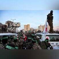 פעילי חמאס והצלב האדום בעזה, | Omar AL-QATTAA / AFP