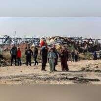 תושבי עזה שחוזרים צפונה, חוצים נקודת בידוק בציר נצרים. | אעבד ראחים חאטיב, פלאש 90