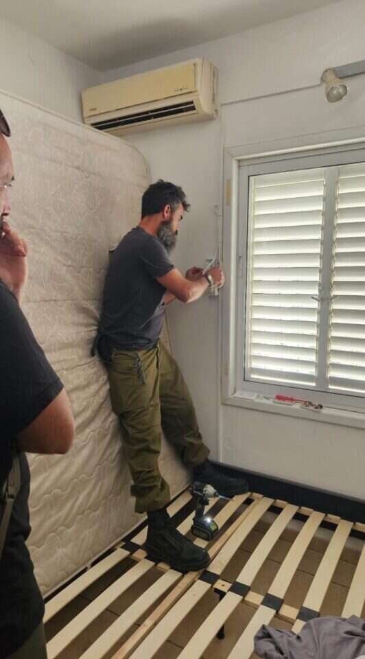 אנשי "צוות עורף" בפעילות למען משפחות המילואים