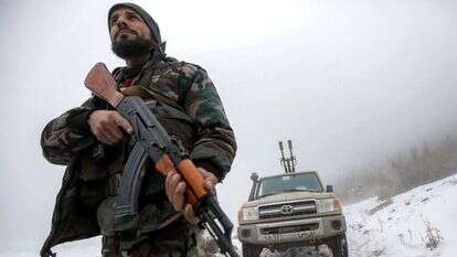 חיל מטעם הממשלה הסורית במחוז חומס בסוריה בשבוע שעבר. | AFP