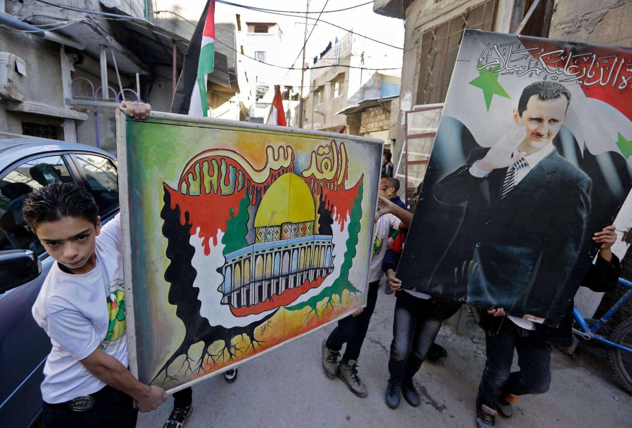 הפגנה סורית-פלסטינית אנטי-ישראלית בדמשק. | AFP