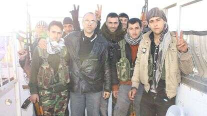 לוחמים כורדים בסוריה. | ג'ונתן ספייר