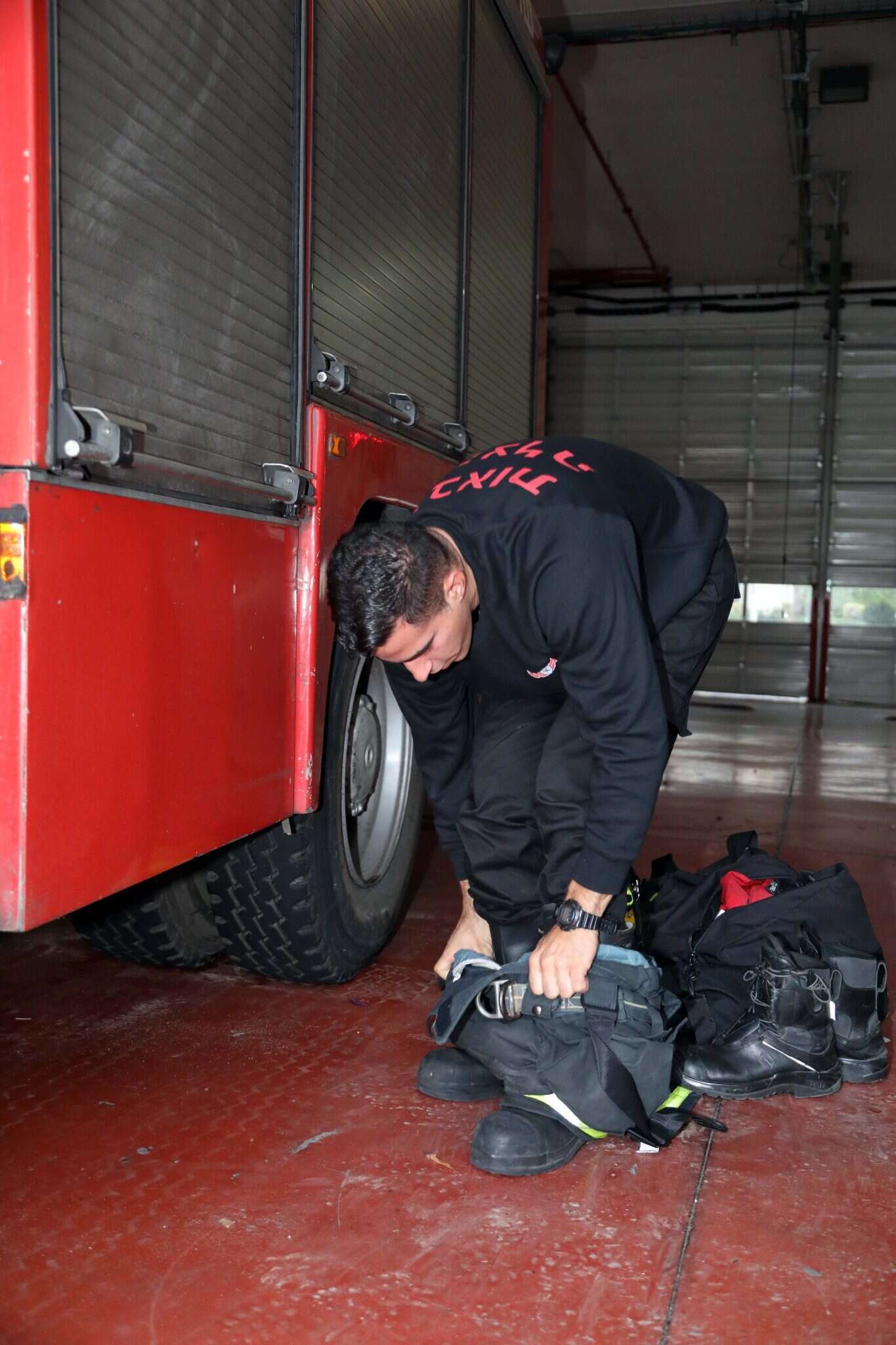 צוות הכבאים של התחנה האזורית ת"א. | גדעון מרקוביץ'