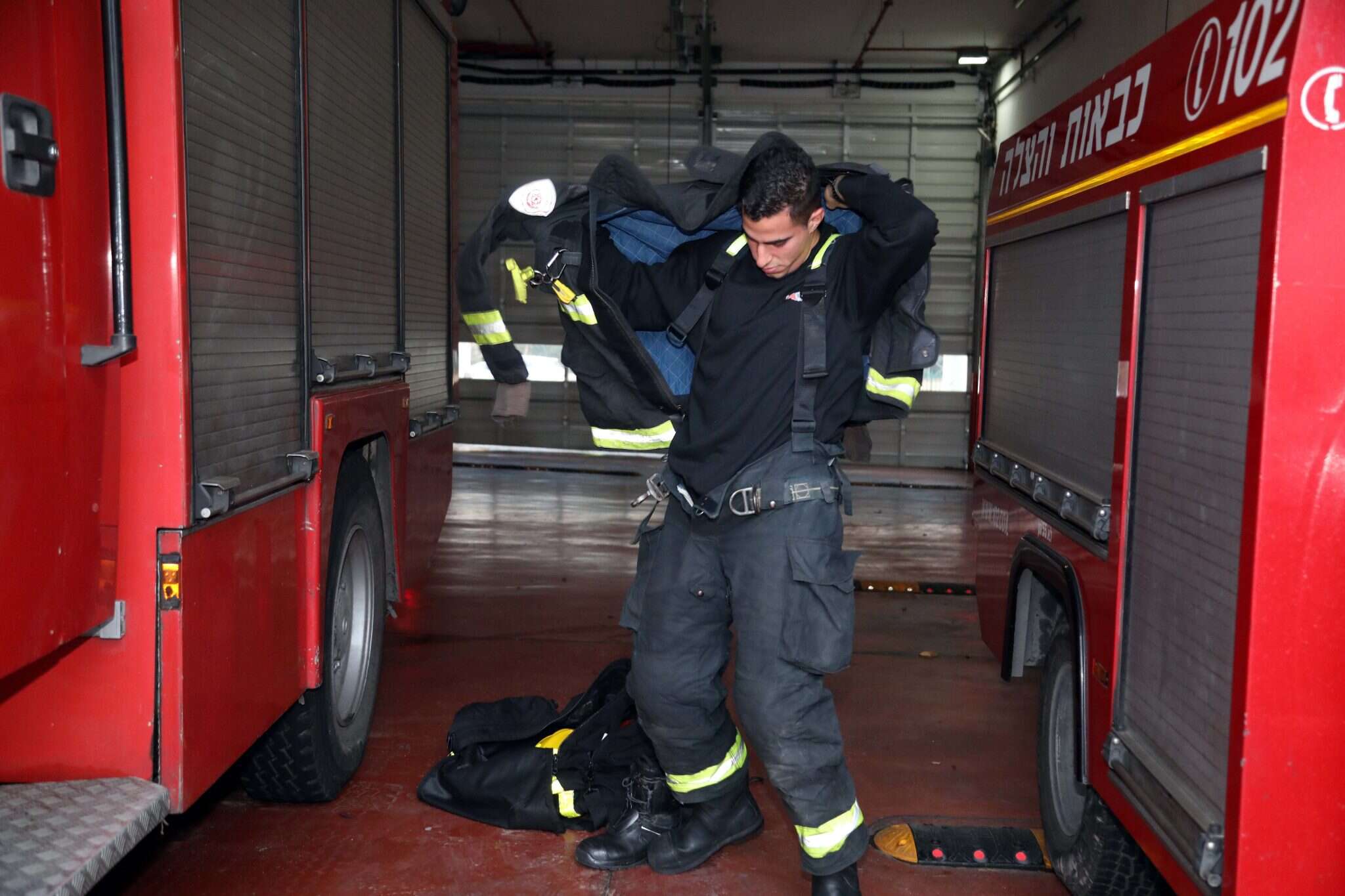 צוות הכבאים של התחנה האזורית ת"א. | גדעון מרקוביץ'