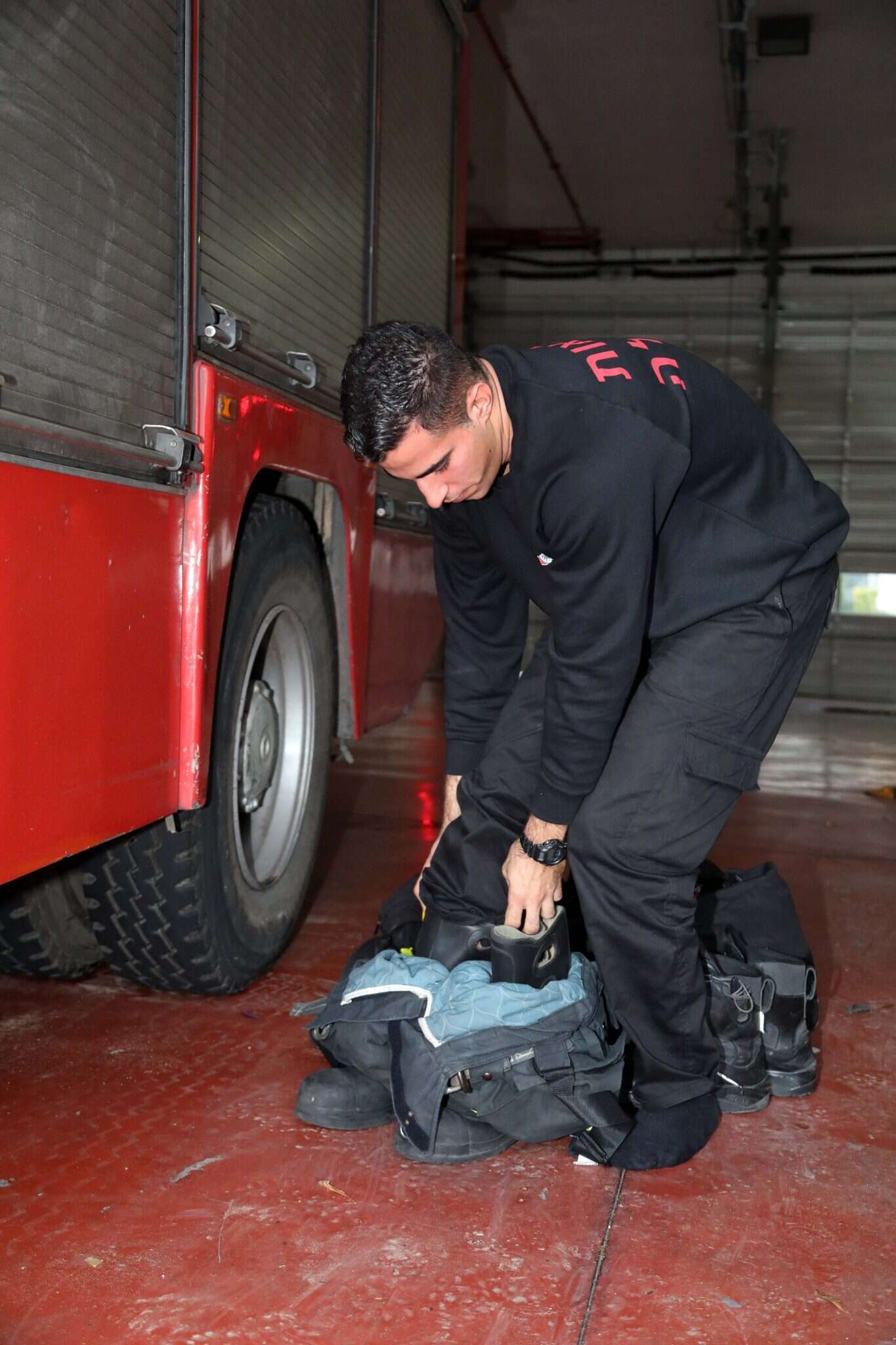 צוות הכבאים של התחנה האזורית ת"א. | גדעון מרקוביץ'