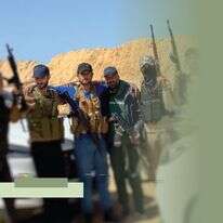 אבו־שבאב עם אנשי המיליציה | מתוך דף הפייסבוק של המיליציה