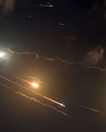 עם כלביא: טילים איראניים בשמי ישראל | AFP
