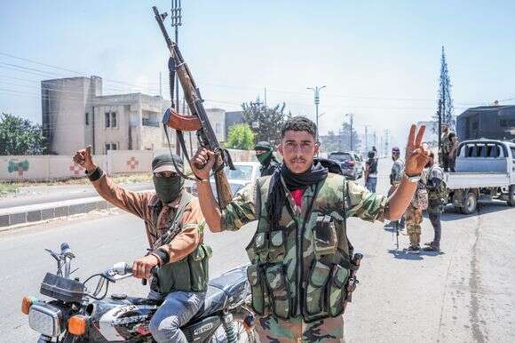 Combattants druzes à Mazraa, en Syrie | EPA Combattants druzes à Mazraa, en Syrie | EPA