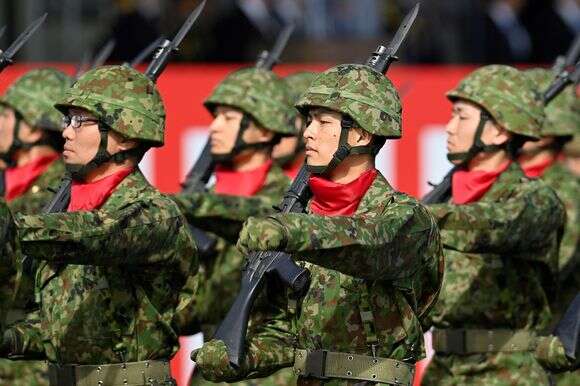 חברי כוחות ההגנה העצמית היפניים (JSDF) | AFP חברי כוחות ההגנה העצמית היפניים (JSDF) | AFP