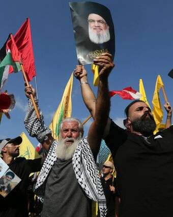תומכי חיזבאללה ביום השנה לחיסול מנהיג הארגון לשעבר חסן נסראללה | EPA
