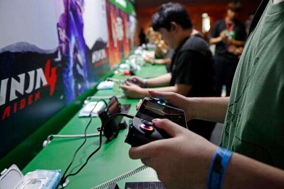 גיימרים | EPA/RUNGROJ YONGRIT גיימרים | EPA/RUNGROJ YONGRIT