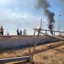 מחבלים פורצים את הגדר ב־7 באוקטובר | גטי אימג'ס