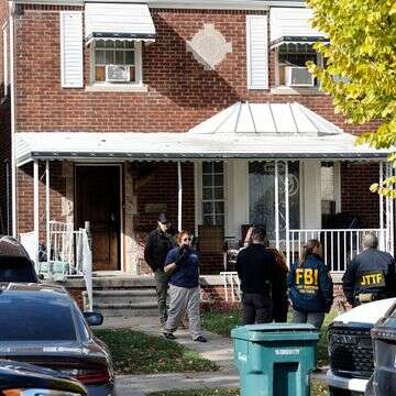 כוחות של ה-FBI למלחמה בטרור במהלך החיפוש בתא הטרור שנחשף בדירבורן, מישיגן | AFP