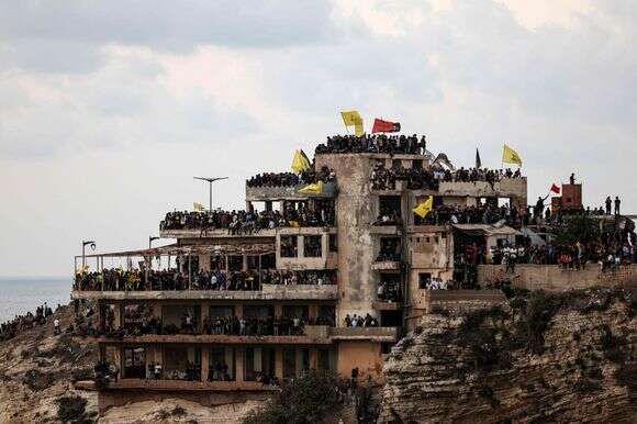 פעילי חזבאללה בבניין נטוש בביירות בספטמבר | AFP פעילי חזבאללה בבניין נטוש בביירות בספטמבר | AFP