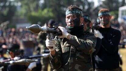 ילדים פלסטינים במחנה אימונים של חמאס | עאבד ראחים חאטיב, פלאש 90 ילדים פלסטינים במחנה אימונים של חמאס | עאבד ראחים חאטיב, פלאש 90