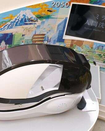 מכונת הכביסה לבני אדם ביפן | AFP מכונת הכביסה לבני אדם ביפן | AFP