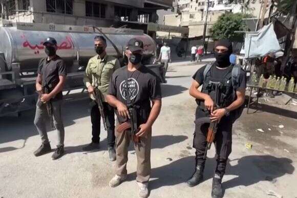 שוטרים של החמאס בעזה, לפני כחודשיים | צילום מסך מיוטיוב - רויטרס שוטרים של החמאס בעזה, לפני כחודשיים | צילום מסך מיוטיוב - רויטרס