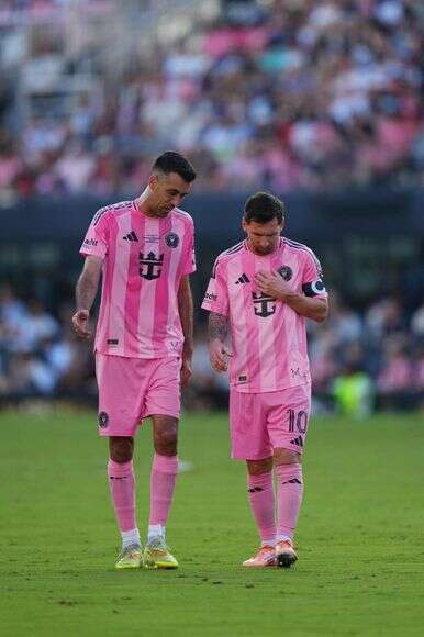 שיחקו יחד מאז 2008. ליונל מסי וסרחיו בוסקטס | AFP