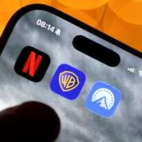 סמלילי האפליקציות של וורנר ברדרס, נטפליקס ופרמאונט | EPA סמלילי האפליקציות של וורנר ברדרס, נטפליקס ופרמאונט | EPA