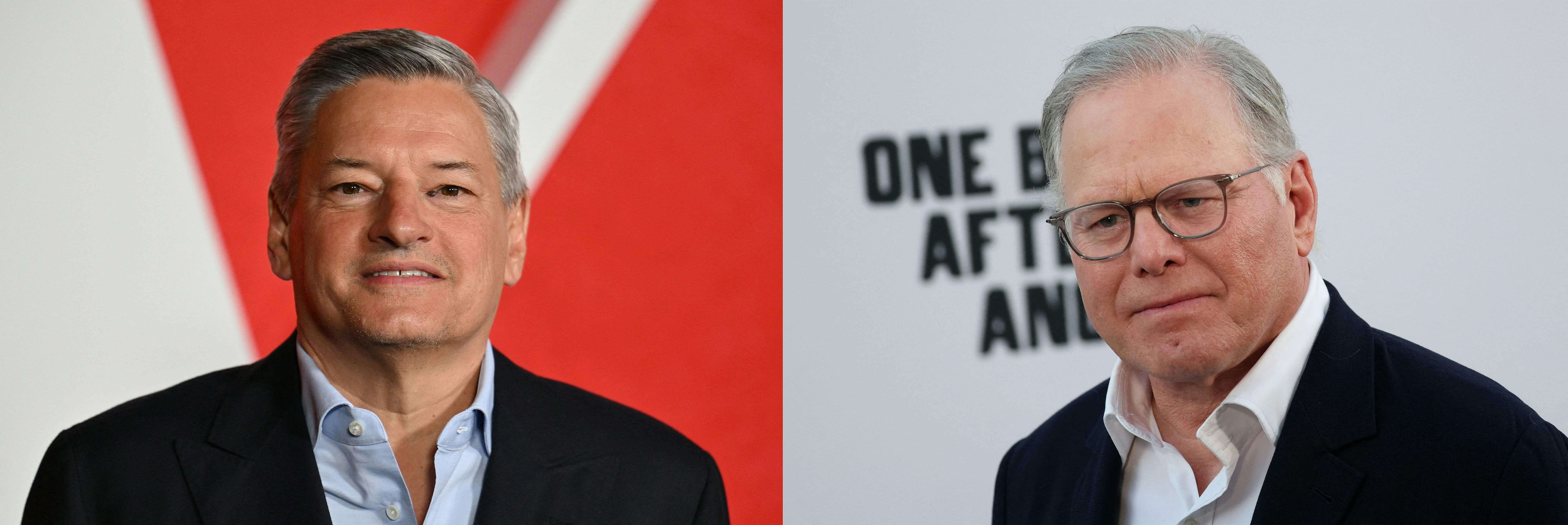 מנכ"ל וורנר ברדרס, דייוויד זסלב (מימין) ומנכ"ל נטפליקס טד סרנדוס | AFP מנכ"ל וורנר ברדרס, דייוויד זסלב (מימין) ומנכ"ל נטפליקס טד סרנדוס | AFP