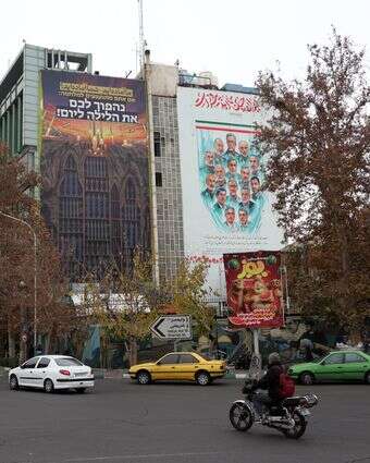 שלטי חוצות אנטי־ישראליים בכיכר פלסטין בטהרן, השבוע | EPA