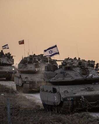 "ראיתי לראשונה איך צה"ל נראה כשהוא רוצה באמת להכות באויב". כוחות שריון מול עזה, 12 באוקטובר 2023 | גטי אימג'ס