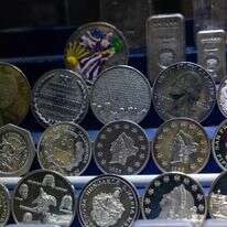 מטבעות כסף בוול סטריט | AFP מטבעות כסף בוול סטריט | AFP