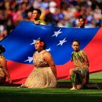 רקדנים על רקע דגל סמואה | EPA רקדנים על רקע דגל סמואה | EPA