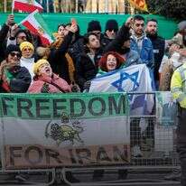 מחאות נגד המשטר האיראני דף הבית | EPA/TOLGA AKMEN