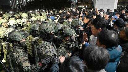 מהומות במהלך משפטו של נשיא דרום קוריאה לשעבר | Jung Yeon-je / AFP