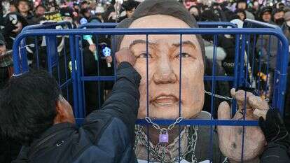 הפגנה נגד נשיא דרום קוריאה לשעבר | ANTHONY WALLACE / AFP