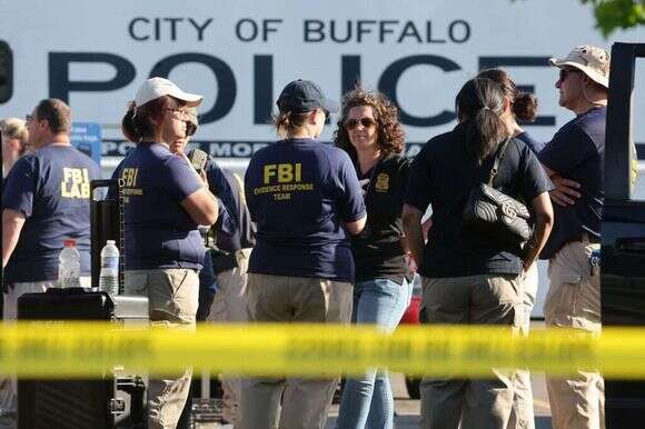 שוטרים וסוכני FBI בזירת אירוע, ארכיון | AFP שוטרים וסוכני FBI בזירת אירוע, ארכיון | AFP