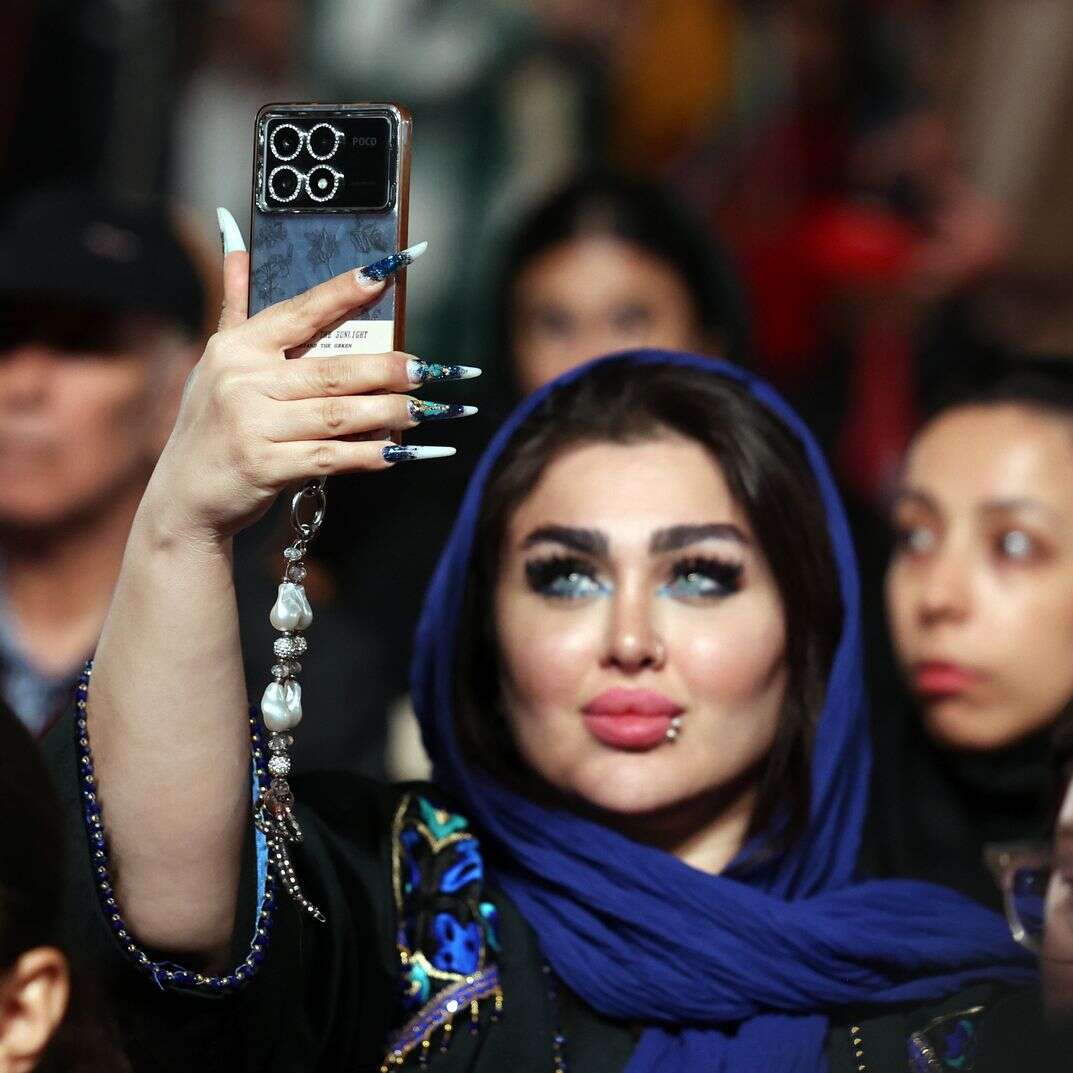 אישה איראנית, אילוסטרציה | EPA/ABEDIN TAHERKENAREH