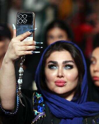 אישה איראנית, אילוסטרציה | EPA/ABEDIN TAHERKENAREH